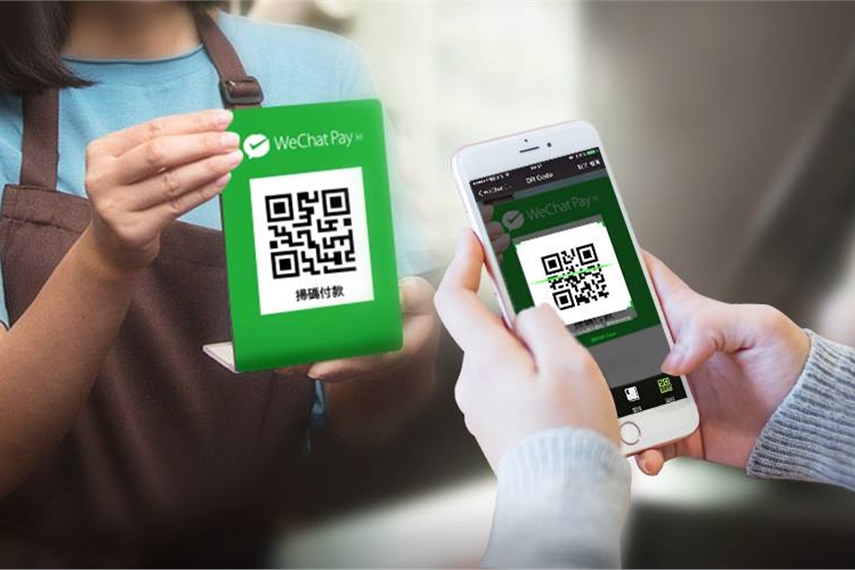 Person using wechat pay qr code
